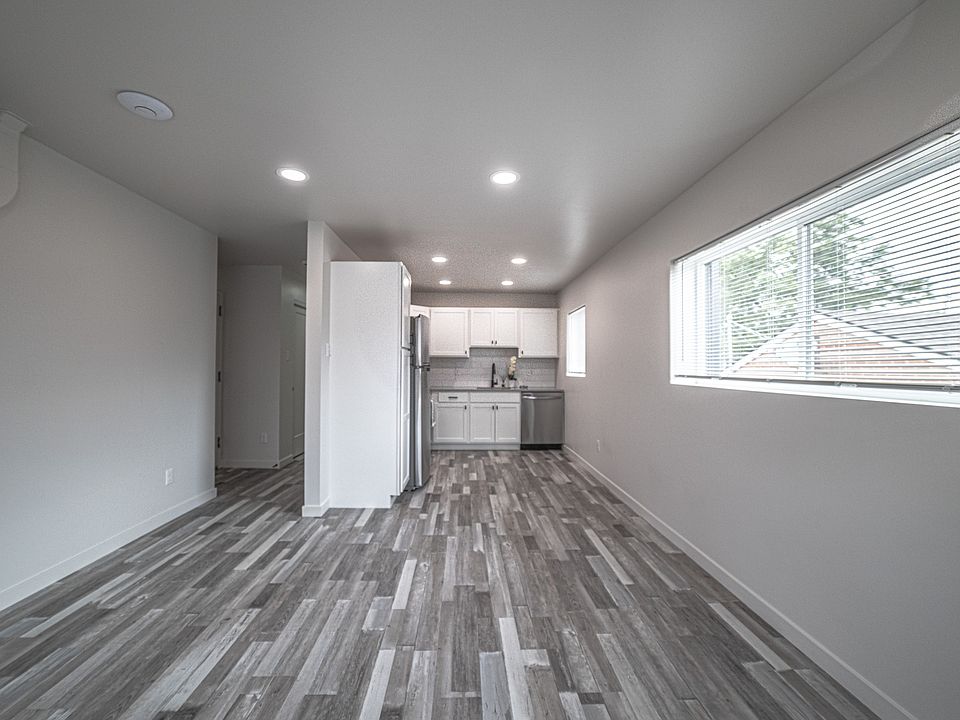 New modern kitchen and dining area. Recessed lighting.