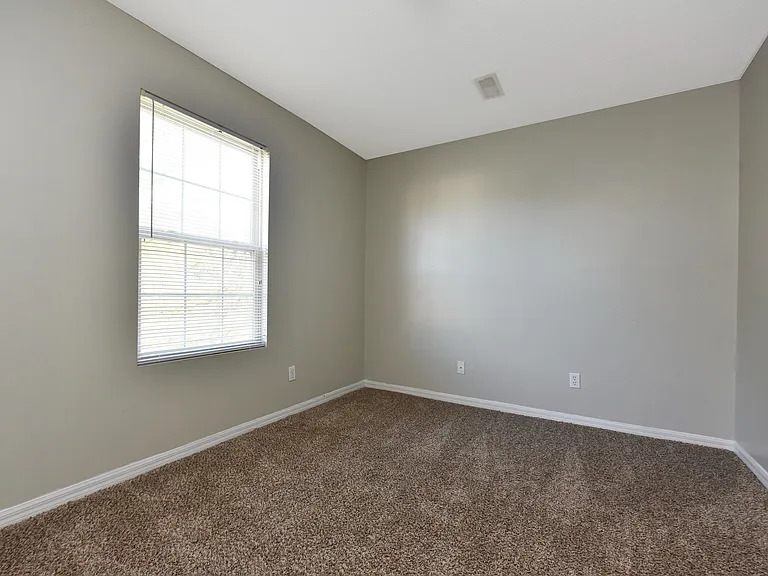 Bedroom with carpet