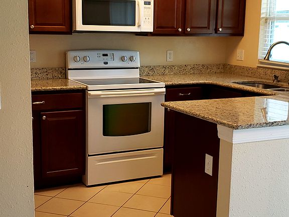 Solid wood cabinets, granite
