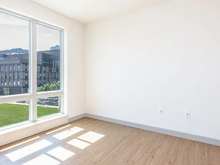 The Flats - Bedroom with Oversized Windows