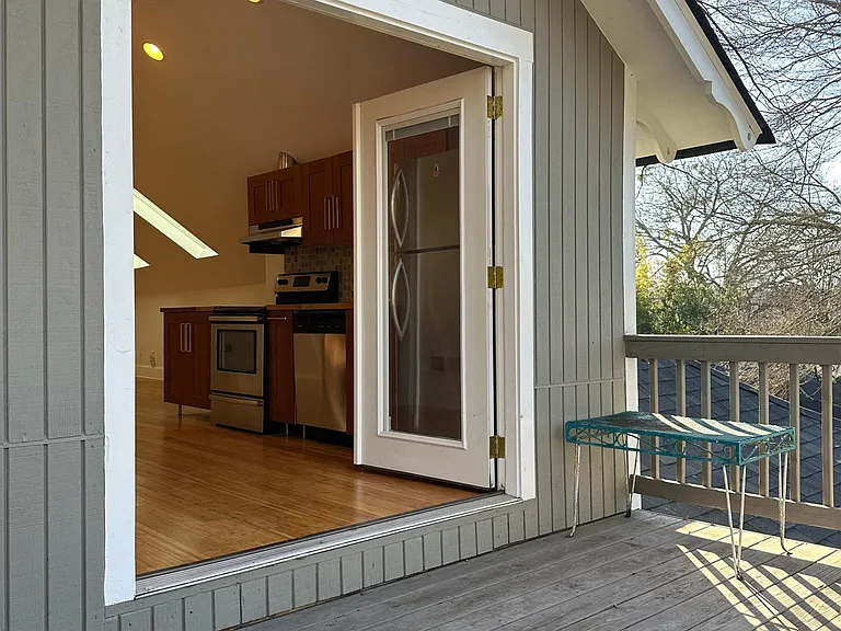 French doors open into kitchen-great for entertaining in spring and fall