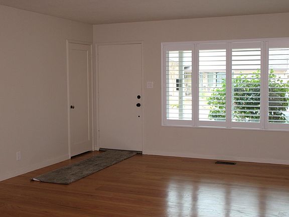 Recessed lighting and ceiling fan added after photo taken