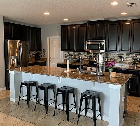 Upgraded kitchen includes stainless appliances