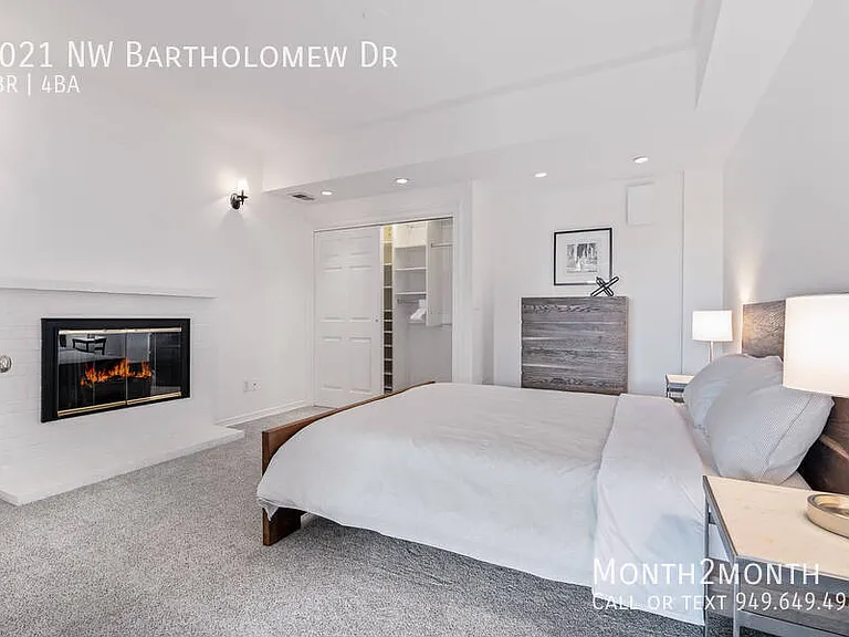 9021 NW Bartholomew Dr — Photo 25