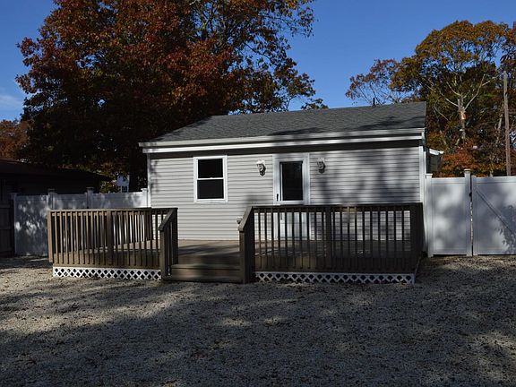 back deck with fenced in yard