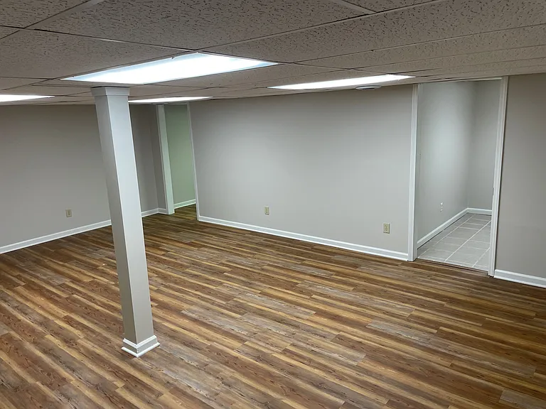 Fully renovated basement with 4th bedroom option and laundry room
