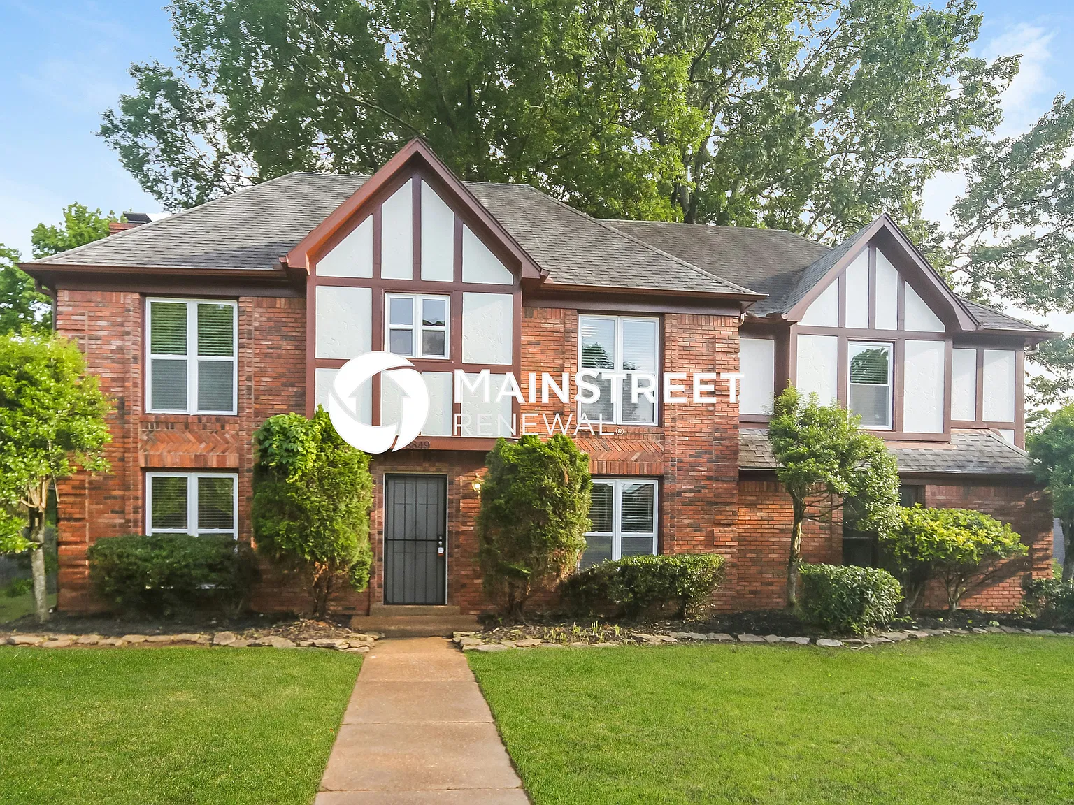 8849 Woodmark Cove — Photo 1