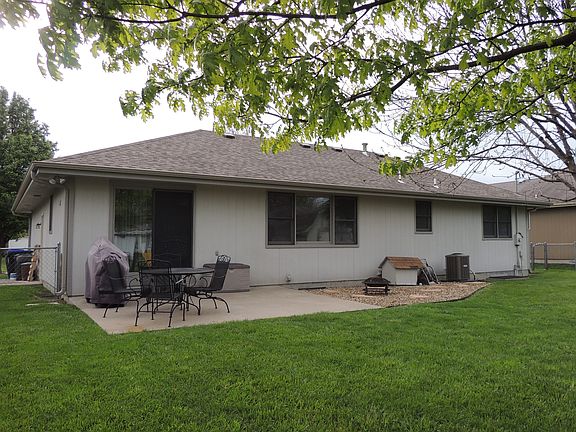 back of house with patio