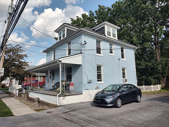Corner view showing the off-street parking. 1st floor tenant has one space and the 2nd floor tenant has one space