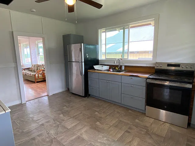 View of kitchen from the Primary Suite doorway