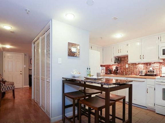 Lots of closet space and seating in kitchen