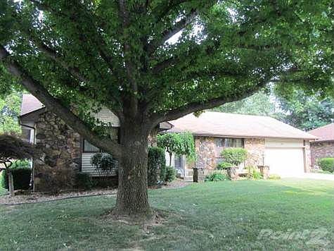 Front view of home situated on a quiet cul de sac setting.
