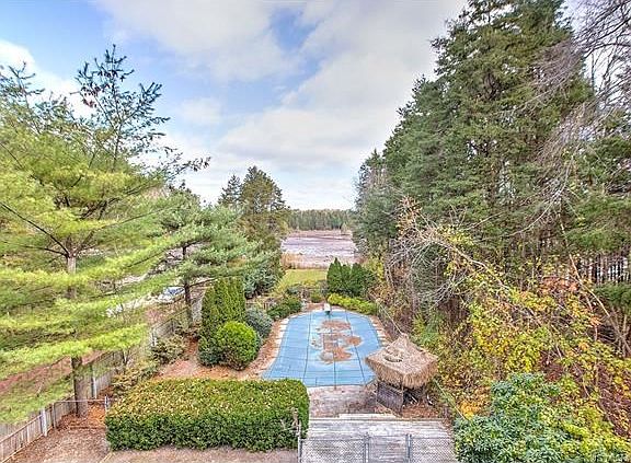 3rd fl deck: view of pool & lake