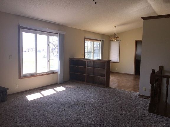 Living Room with wood burning fireplace.