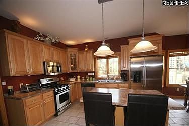 4th image of 8739 Eastlynn Ave NW