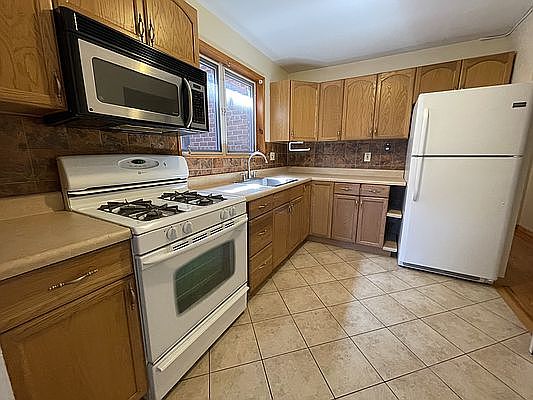 2nd image of 51-16 71st St #2