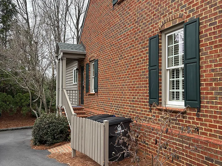 Kitchen door to side driveway around to the garage/back area parking