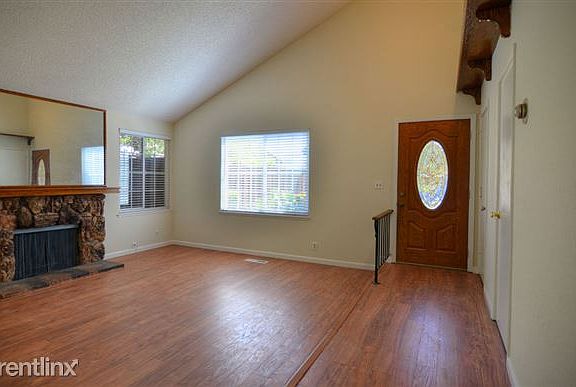 Spacious Living Room w/Tall Ceilings & Fireplace