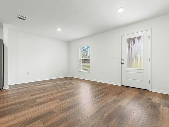 The dining room is just off of the kitchen, making it easy to host