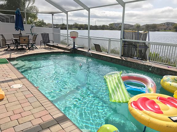 Heated pool with fountains