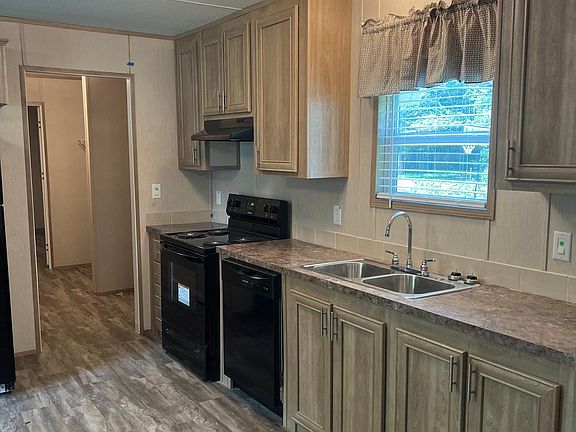 Energy-efficient appliances included, including a dishwasher.