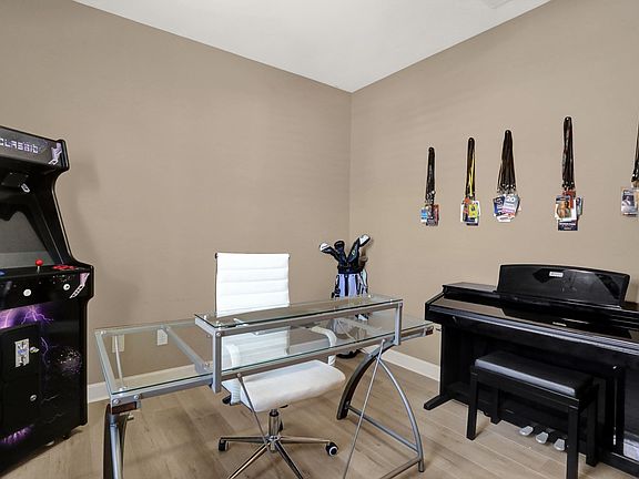 5th image of 8523 Woodland Rose Cir N