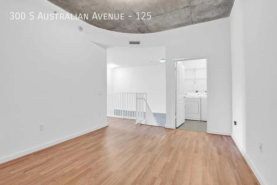 Desirable & spacious 2-story townhome with dramatic 16-20 ft ceilings — Photo 4