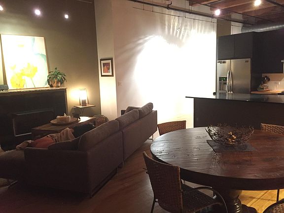 lights aesthetically placed throughout the home, talk 16 feet ceilings, gas fireplace.
