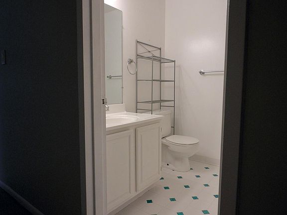 Hallway view of spare bathroom