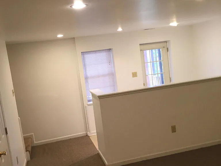 Finished downstairs, walk out to lower level screened in porch
