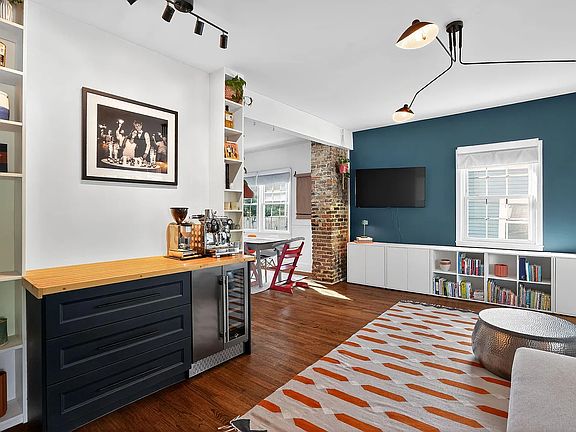 living room with coffee bar & wine fridge