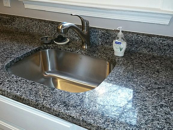 New under mount sink and faucet