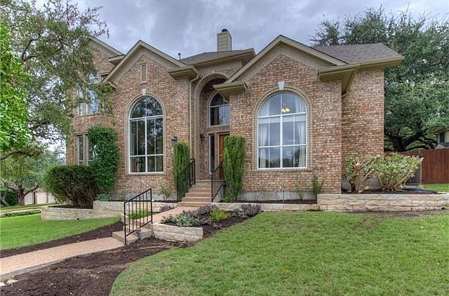 Beautiful 4 bd + office, and 4 full bath home on corner lot in cul-de-sac.