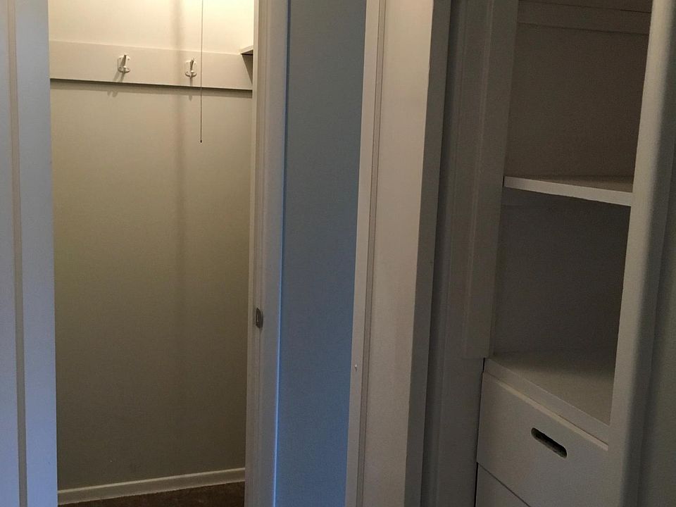 Walk-in closet and hall closet w/built-in drawers 