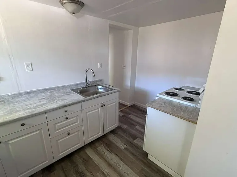 208 Utica St — Photo 8