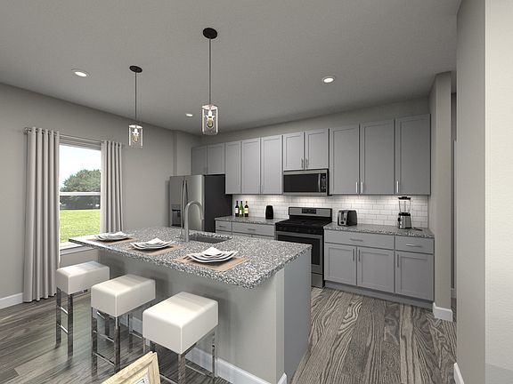 Prepare dinner while the kids sit and do homework at the kitchen island.