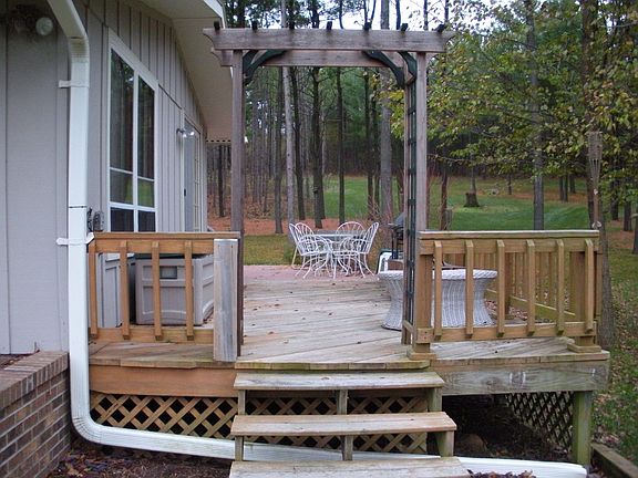 Side of House with Sliding Glass Doors and Deck