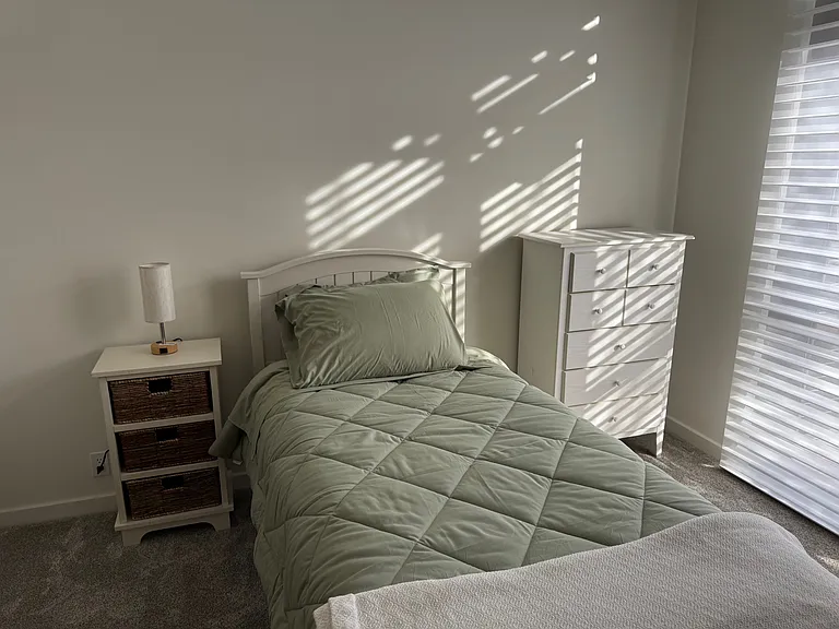 2nd bedroom. Twin bed and balcony.