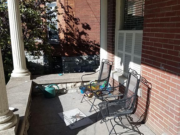 Great front porch on walking court