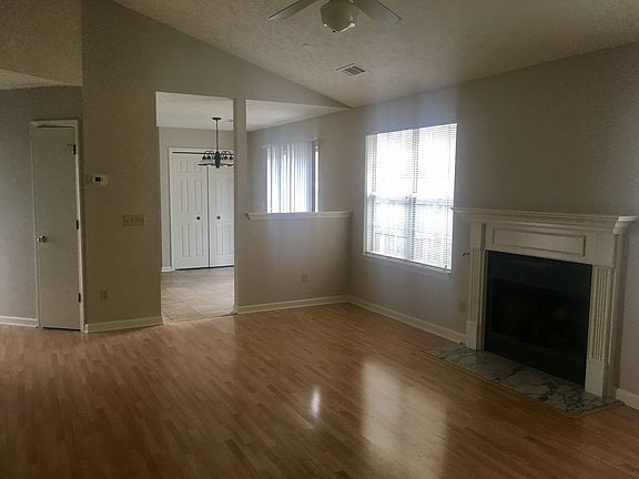 gas fireplace, coat closet, eat-in kitchen
