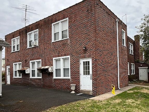 Side of building with mailboxes
