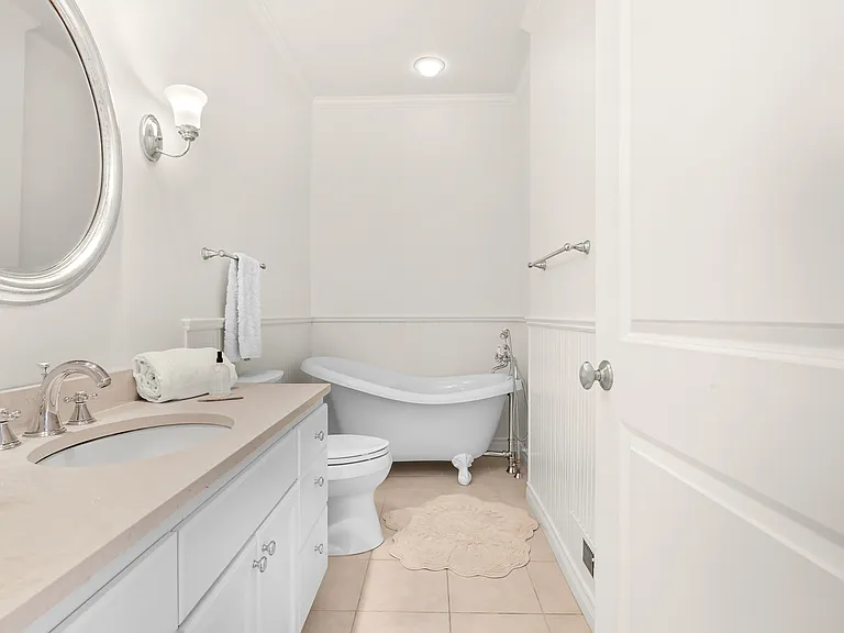 Master bath with clawfoot tub.