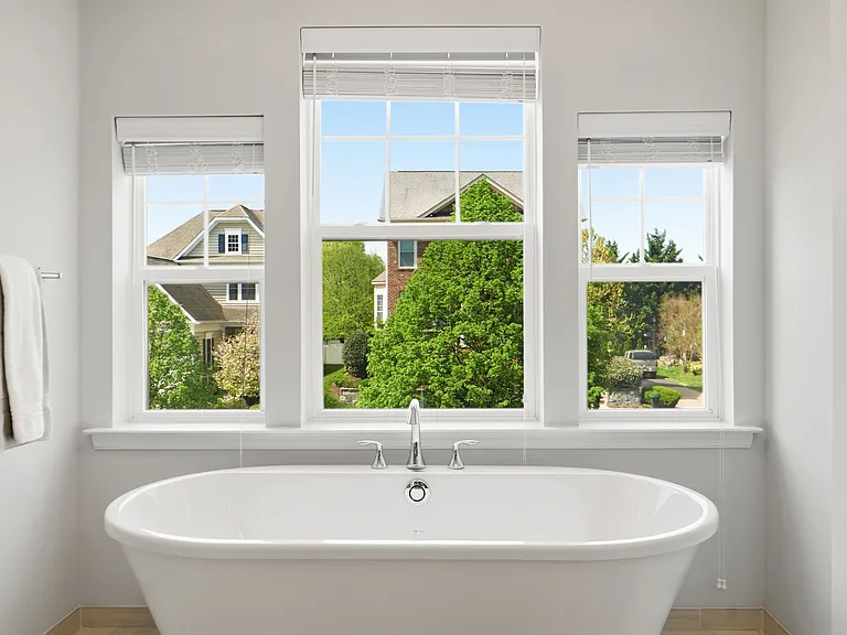 Beautiful en-suite with large shower, soaking tub, and double vanity.