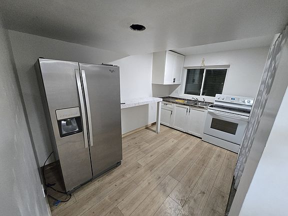 3rd image of 3037 S Breeze Dr W
