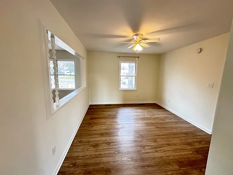 Bonus space off the dining area with a view into the living room.