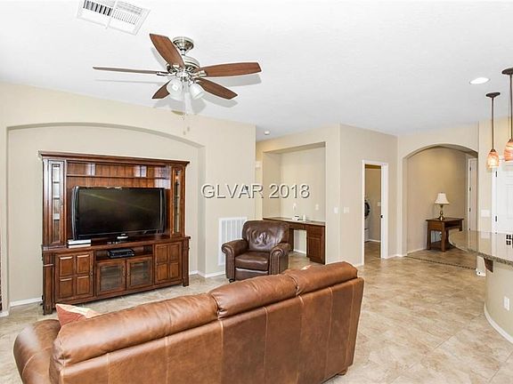 Bright light filled greatroom. Desk nook in the hallway. All furniture included.