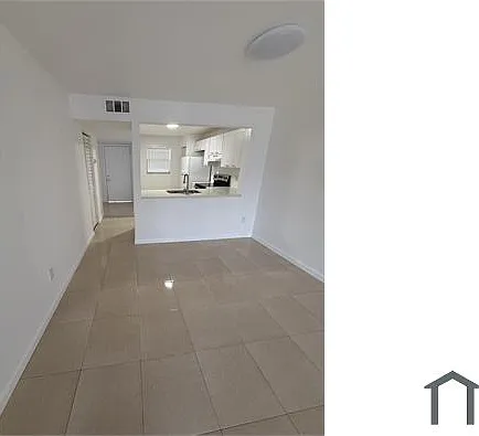 860 NE 207th Ter #106 — Photo 1