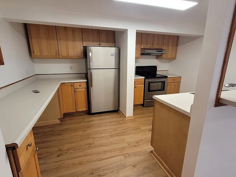 Kitchen w/ Refrigerator, Range/Stove, and Dishwasher