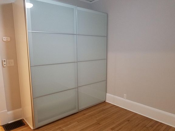 huge double wardrobe closets with rod, shelving, drawers and double shoe rack