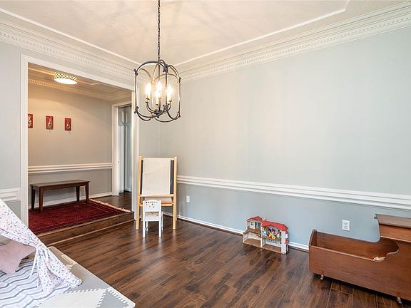 Formal Dining room is located to the right of the entry, and easily converts to home office, music room or play room, if needed.